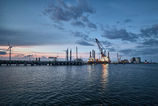 View Of Port At Sunset.